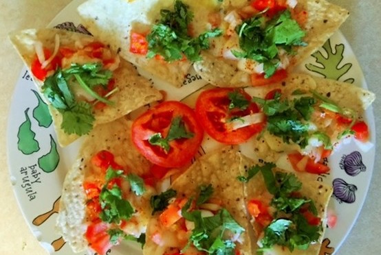 Add vegetables & little spice to Nachos