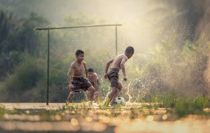 Children playing in mud