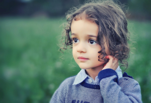 What are the risk factors and causes of childhood cancer